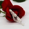 Women's silver brooches